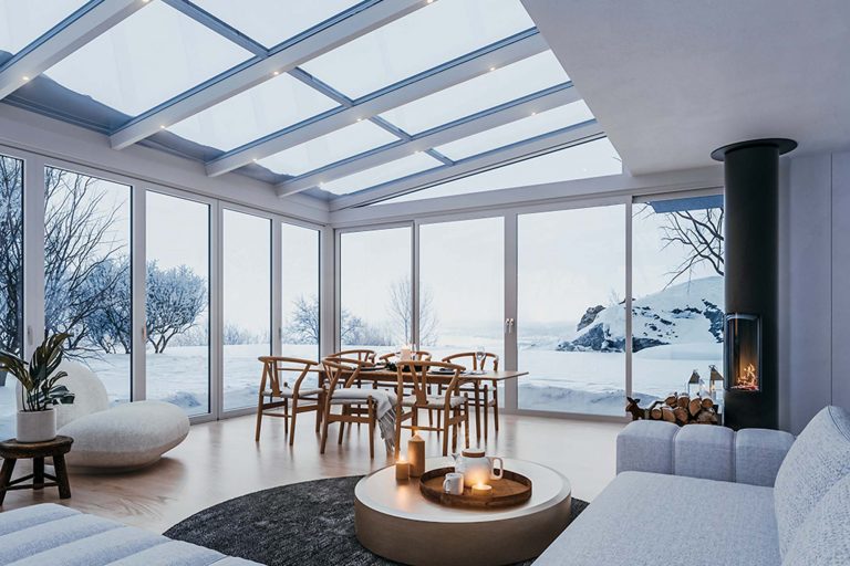 Wintergarten mit Kamin und Schnee